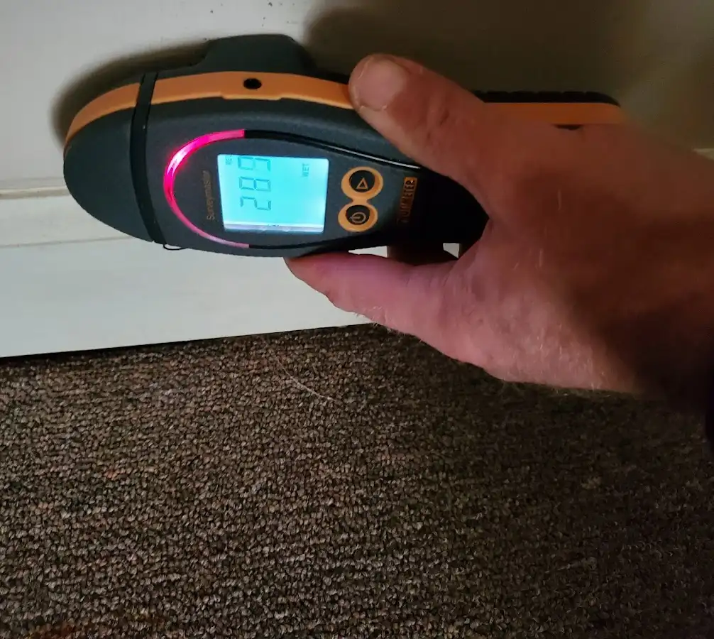 Moisture detection at baseboard during Mold Inspection & Testing in Warsaw